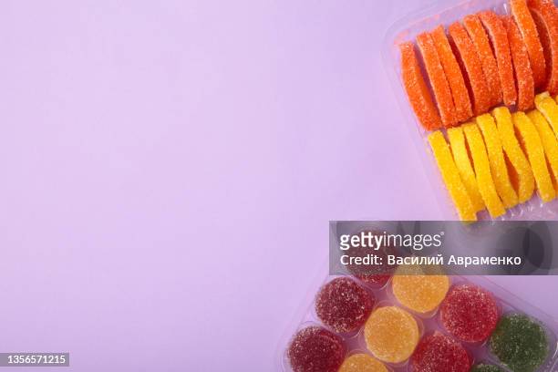 jelly sugar candies purple background with