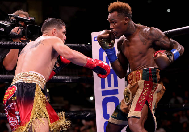 Jermell Charlo and Brian Castano exchange punches during their Super Welterweight fight at AT&T Center on July 17, 2021 in San Antonio, Texas. The...