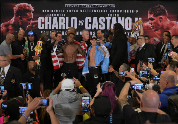Jermell Charlo and Brian Castano II on stage in front of media during the official weigh at the Westin LAX for their super welterweight championship...
