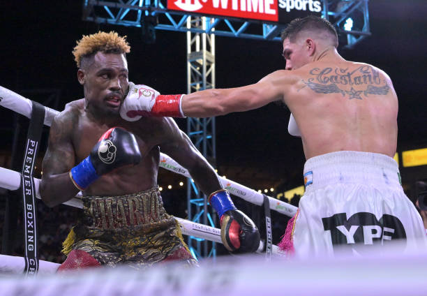 Jermell Charlo exchanges punches in the ring with Brian Castano during their super middleweight title fight at Dignity Health Sports Park on May 14,...
