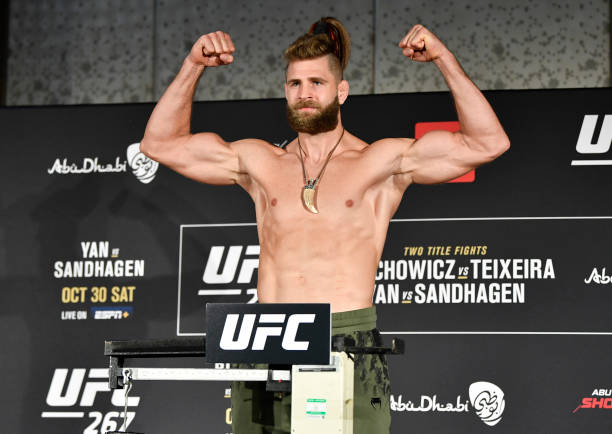 Jiri Prochazka of the Czech Republic poses on the scale during the UFC 267 official weigh-in at Hilton Abu Dhabi Yas Island on October 29, 2021 in...