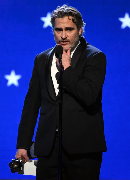 Joaquin Phoenix accepts the Best Actor award for 'Joker' onstage during the 25th Annual Critics' Choice Awards at Barker Hangar on January 12 2020 in...