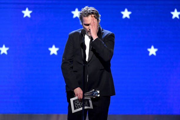 Joaquin Phoenix accepts the Best Actor award for 'Joker' onstage during the 25th Annual Critics' Choice Awards at Barker Hangar on January 12 2020 in...