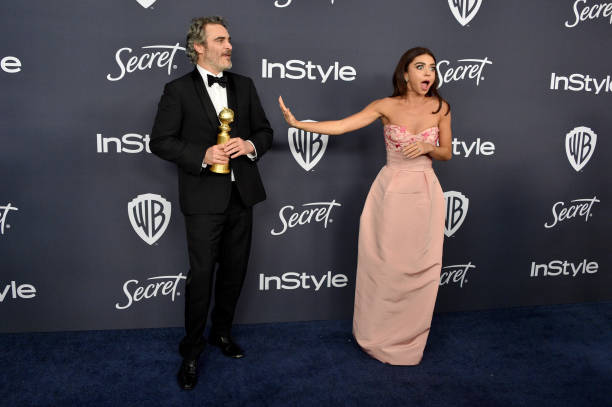 Joaquin Phoenix and Sarah Hyland attend the 21st Annual Warner Bros And InStyle Golden Globe After Party at The Beverly Hilton Hotel on January 05...