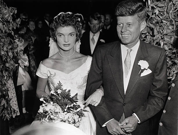 John F. Kennedy and Jacqueline Lee Bouvier wed on September 12 in St. Mary`s Church in Newport, Rhode Island, USA.