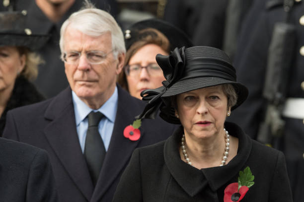 John Major and Theresa May during the annual Remembrance Sunday Service at The Cenotaph on November 12 2017 in London England