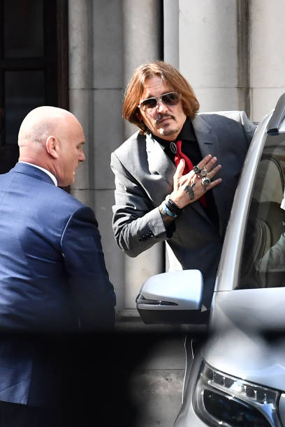 Johnny Depp departs the Royal Courts of Justice Strand on July 21 2020 in London England The Hollywood Actor is suing News Group Newspapers and the...