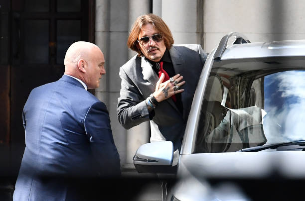 Johnny Depp departs the Royal Courts of Justice Strand on July 21 2020 in London England The Hollywood Actor is suing News Group Newspapers and the...