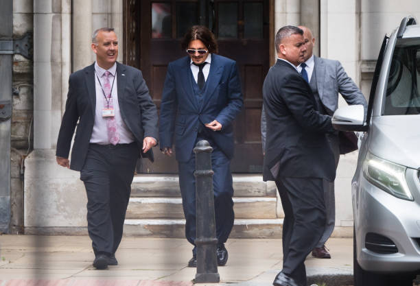 Johnny Depp leaves the Royal Courts of Justice Strand on July 07 2020 in London England The American actor is taking News Group Newspapers publishers...