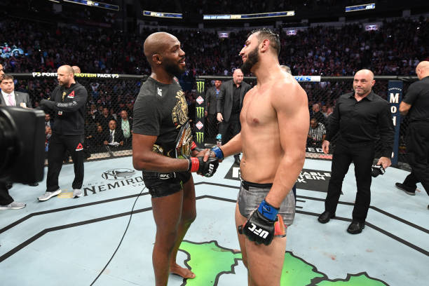 Jon Jones and Dominick Reyes interact after their light heavyweight championship bout during the UFC 247 event at Toyota Center on February 08, 2020...