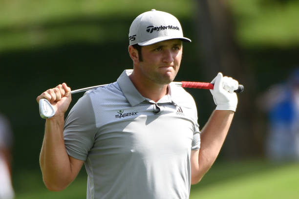 Jon Rahm of Spain reacts to his second shot on the 18th hole during the third round of the 2017 PGA Championship at Quail Hollow Club on August 12,...