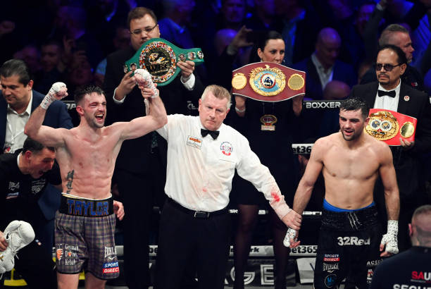 Josh Taylor is declared the victor over Jack Catterall during the WBA, WBC, WBO & IBF world super-lightweight title fight at the OVO Hydro, on...