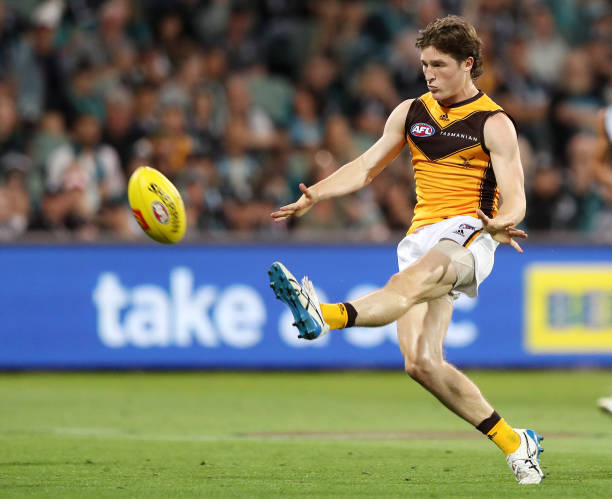 Josh Ward of the Hawks kicks a goal during the 2022 AFL Round 02 match between the Port Adelaide Power and the Hawthorn Hawks at Adelaide Oval on...