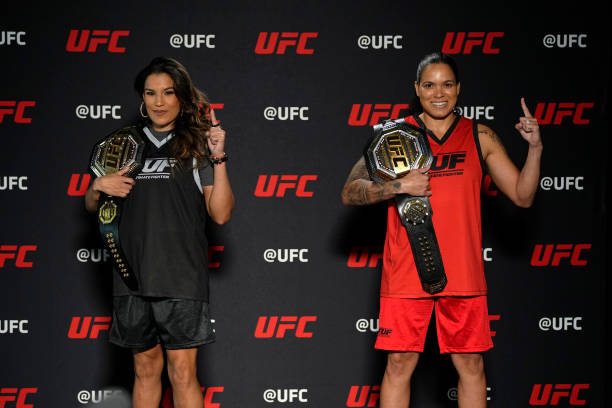 Julianna Pena and Amanda Nunes pose for photos during The Ultimate Fighter media day on February 7, 2022 in Las Vegas, Nevada.