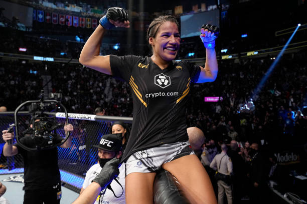 Julianna Pena celebrates her victory over Amanda Nunes of Brazil in their UFC bantamweight championship bout during the UFC 269 on December 11, 2021...