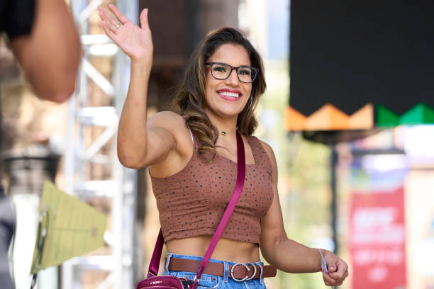 Julianna Pena walks on stage during the Hispanic Heritage Month Athlete Panel at the UFC Fan Experience at The Park & Toshiba Plaza on September 24,...
