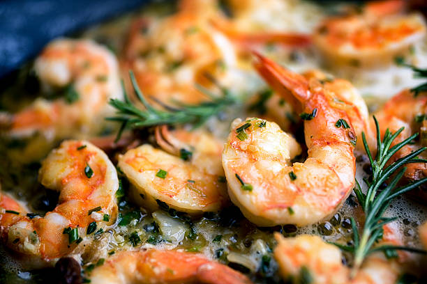 jumbo shrimp scampi sauteeing in butter and olive oil picture