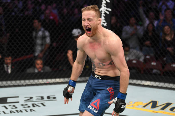 Justin Gaethje reacts after knocking out Edson Barboza of Brazil in their lightweight bout during the UFC Fight Night event at Wells Fargo Center on...