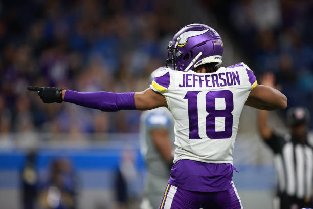 Justin Jefferson of the Minnesota Vikings reacts after a catch during the first half against the Detroit Lions at Ford Field on December 05, 2021 in...