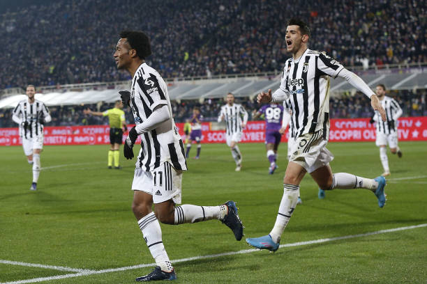 Juventus players celebrate a goal scored by Juan Guillermo Cuadrado Bello during the Coppa Italia Semi Final 1st Leg match between ACF Fiorentina and...