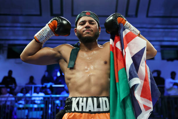 Kahlid Ali celebrates after victory in the Welterweight fight between Khalid Ali and Dario Borosa at York Hall on September 16, 2022 in London,...