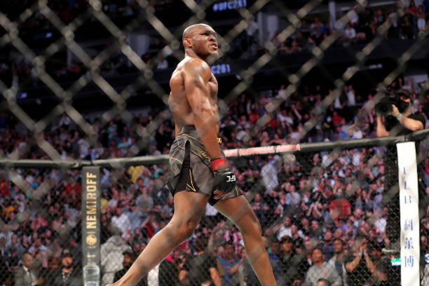 Kamaru Usman of Nigera reacts after knocking out Jorge Masvidal of the United States during the Welterweight Title bout of UFC 261 at VyStar Veterans...