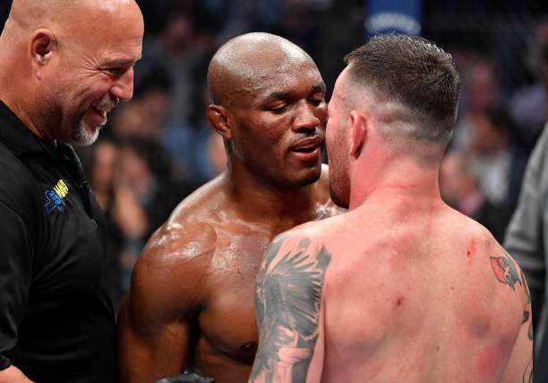 Kamaru Usman of Nigeria and Colby Covington talk after their UFC welterweight championship fight during the UFC 268 event at Madison Square Garden on...