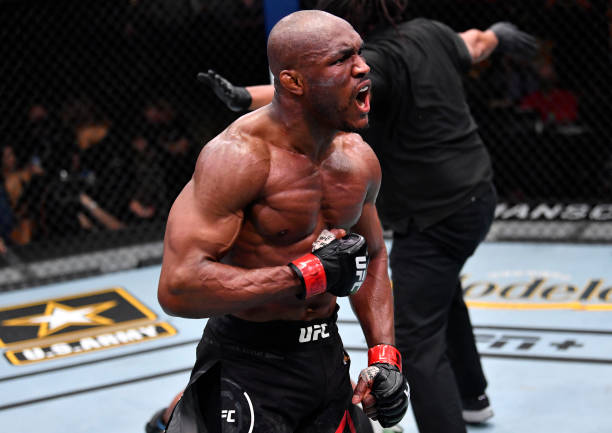 Kamaru Usman of Nigeria reacts after his victory over Gilbert Burns of Brazil in their UFC welterweight championship fight during the UFC 258 event...