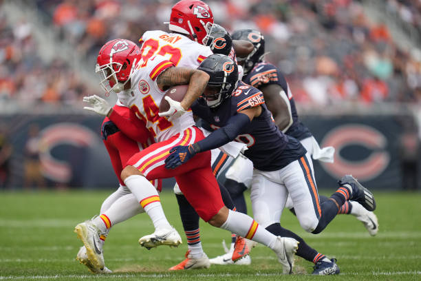 Kansas City Chiefs wide receiver Skyy Moore battles with Chicago Bears linebacker Noah Dawkins during the preseason game between the Chicago Bears...