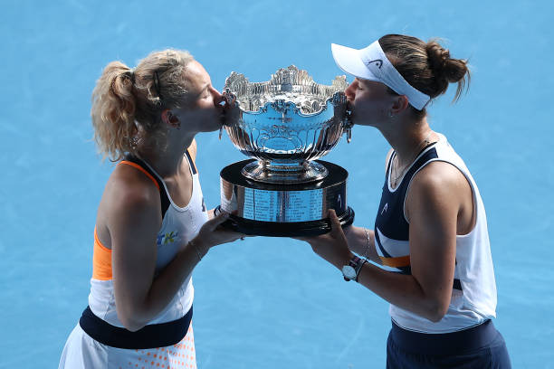 Katerina Siniakova of Czech Republic and Barbora Krejcikova of Czech Republic kiss the championship trophy after winning their Women's Doubles Final...