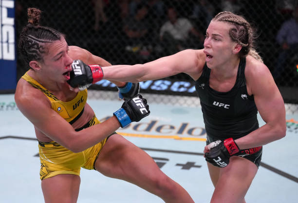Katlyn Chookagian punches Amanda Ribas of Brazil in a flyweight fight at UFC APEX on May 14, 2022 in Las Vegas, Nevada.