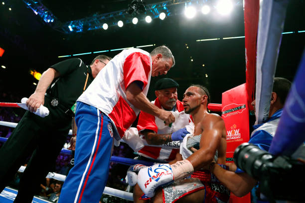 Keith Thurman is treated in his corner between rounds during his WBA welterweight title fight against Manny Pacquiao at MGM Grand Garden Arena on...