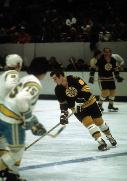 ken-hodge-of-the-boston-bruins-skates-with-the-puck-during-an-nhl-picture-id156924441