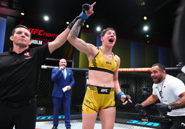 Ketlen Vieira of Brazil reacts after her split-decision victory over Holly Holm in a bantamweight bout during the UFC Fight Night event at UFC APEX...