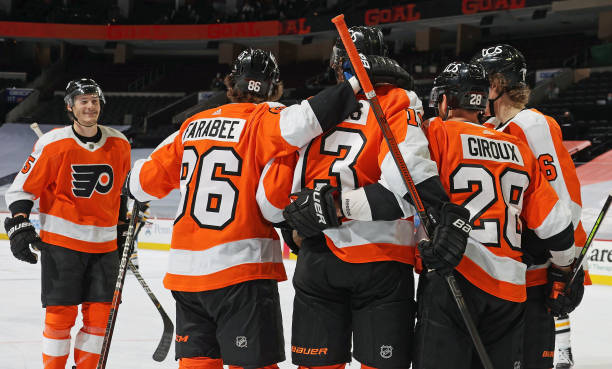 Kevin Hayes of the Philadelphia Flyers celebrates his third period goal against the Pittsburgh Penguins with Philippe Myers, Joel Farabee, Claude...