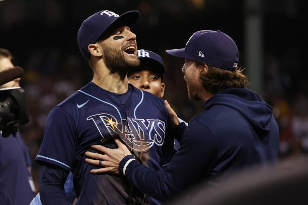 Kevin Kiermaier of the Tampa Bay Rays reacts after Alex Verdugo of the Boston Red Sox was called out at third in the eighth inning during Game 4 of...