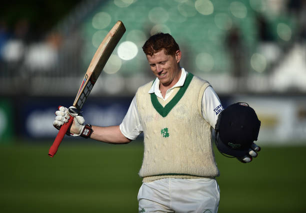 Kevin O'Brien of Ireland celebrates scoring a test century during the fourth day of the international test cricket match between Ireland and Pakistan...