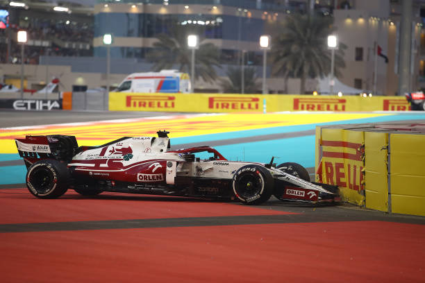 Kimi Raikkonen of Finland driving the Alfa Romeo Racing C41 Ferrari hits the wall leading to a race retirement during the F1 Grand Prix of Abu Dhabi...