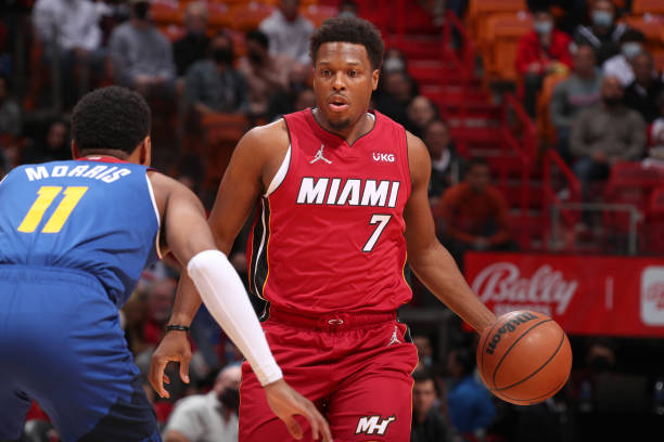 Kyle Lowry of the Miami Heat dribbles the ball during the game against the Denver Nuggets on November 29, 2021 at FTX Arena in Miami, Florida. NOTE...