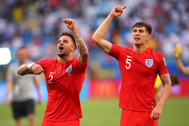 Kyle Walker of England and John Stones of England celebrate at the end of the 2018 FIFA World Cup Russia Quarter Final match between Sweden and...