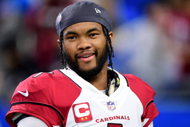 Kyler Murray of the Arizona Cardinals smiles before a game against the Detroit Lions at Ford Field on December 19, 2021 in Detroit, Michigan.