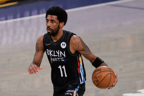 Kyrie Irving of the Brooklyn Nets dribbles during the second half of Game Five of their Eastern Conference first-round playoff series against the...