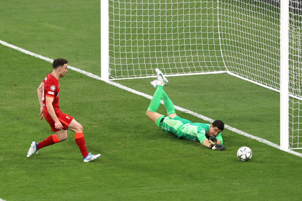 L20 watches as Real Madrid goalkeeper Thibaut Courtois makes a save during the UEFA Champions League final match between Liverpool FC and Real Madrid...