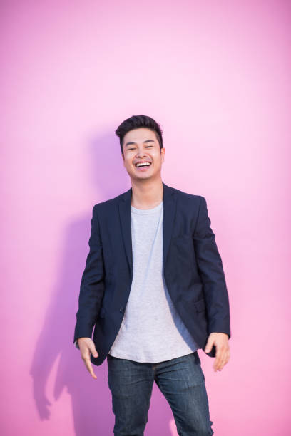 laughing asian young adult hipster - laughing asian man stock pictures, royalty-free photos & images