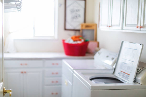 laundry room - top load washer stock pictures, royalty-free photos & images