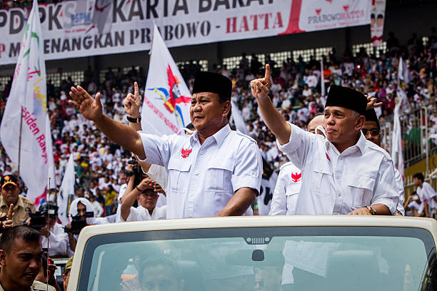 Leader of the Gerindra Party Presidential candidate retired general Prabowo Subianto and vicepresidential candidate Hatta Rajasa greets to supporters...