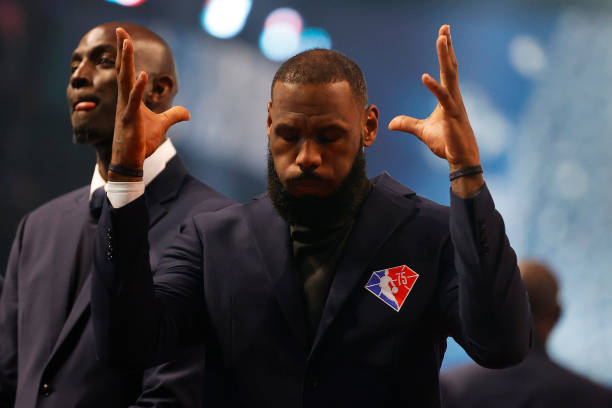 LeBron James reacts after being introduced as part of the NBA 75th Anniversary Team during the 2022 NBA All-Star Game at Rocket Mortgage Fieldhouse...