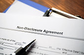 Legal document Non-Disclosure Agreement on paper close up.