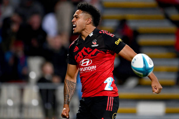 CHRISTCHURCH, NEW ZEALAND - APRIL 01: Leicester Fainga'anuku of the Crusaders celebrates his try during the round seven Super Rugby Pacific match between the Crusaders and the Highlanders at Orangetheory Stadium on April 01, 2022 in Christchurch, New Zealand. (Photo by Hannah Peters/Getty Images)
