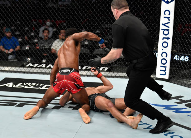 Lerone Murphy of England knocks out Makwan Amirkhani of Finland in a featherweight fight during the UFC 267 event at Etihad Arena on October 30, 2021...